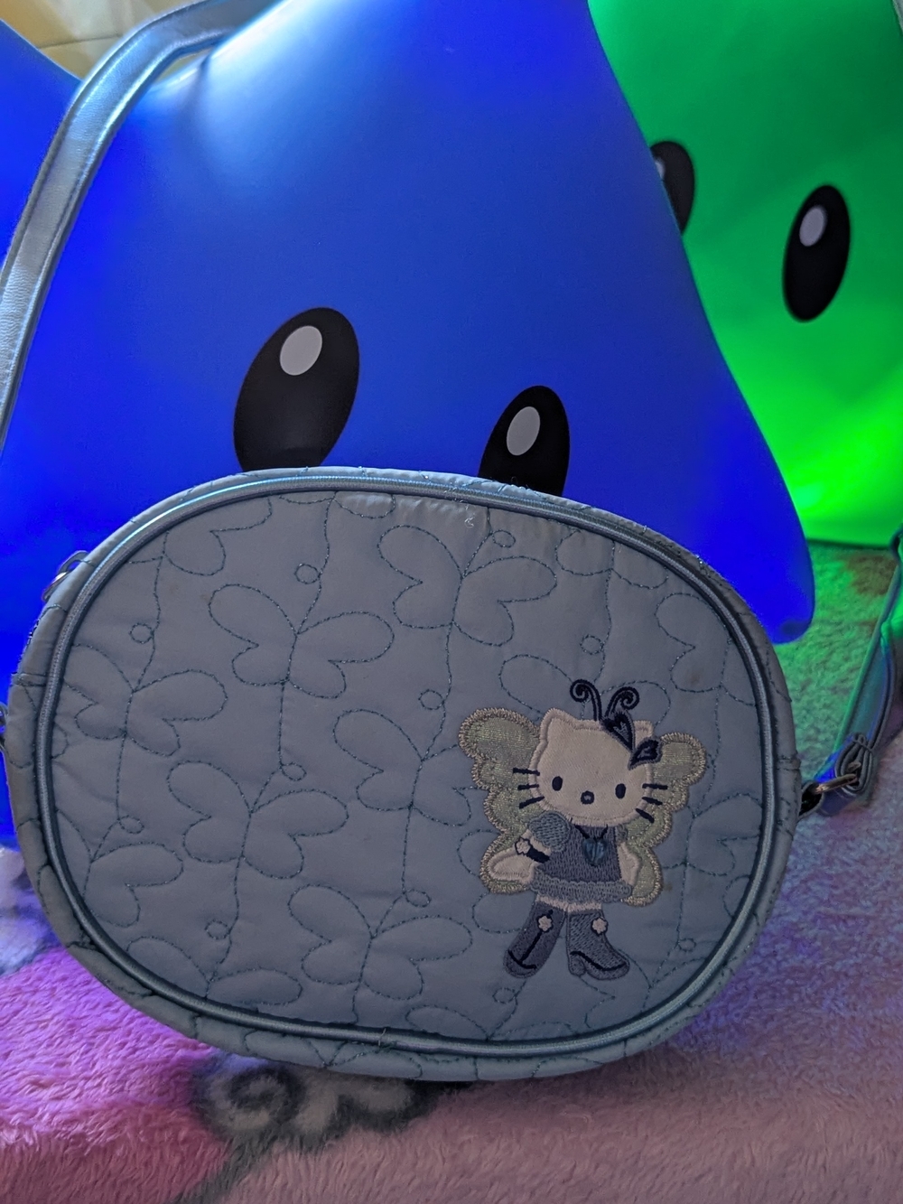 hello kitty bag purse blue boots butterfly wings a little discoloration but loo